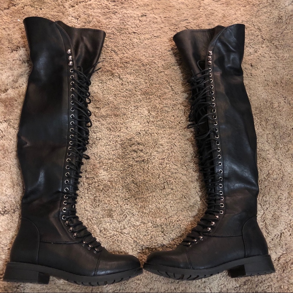 Thigh high combat boots